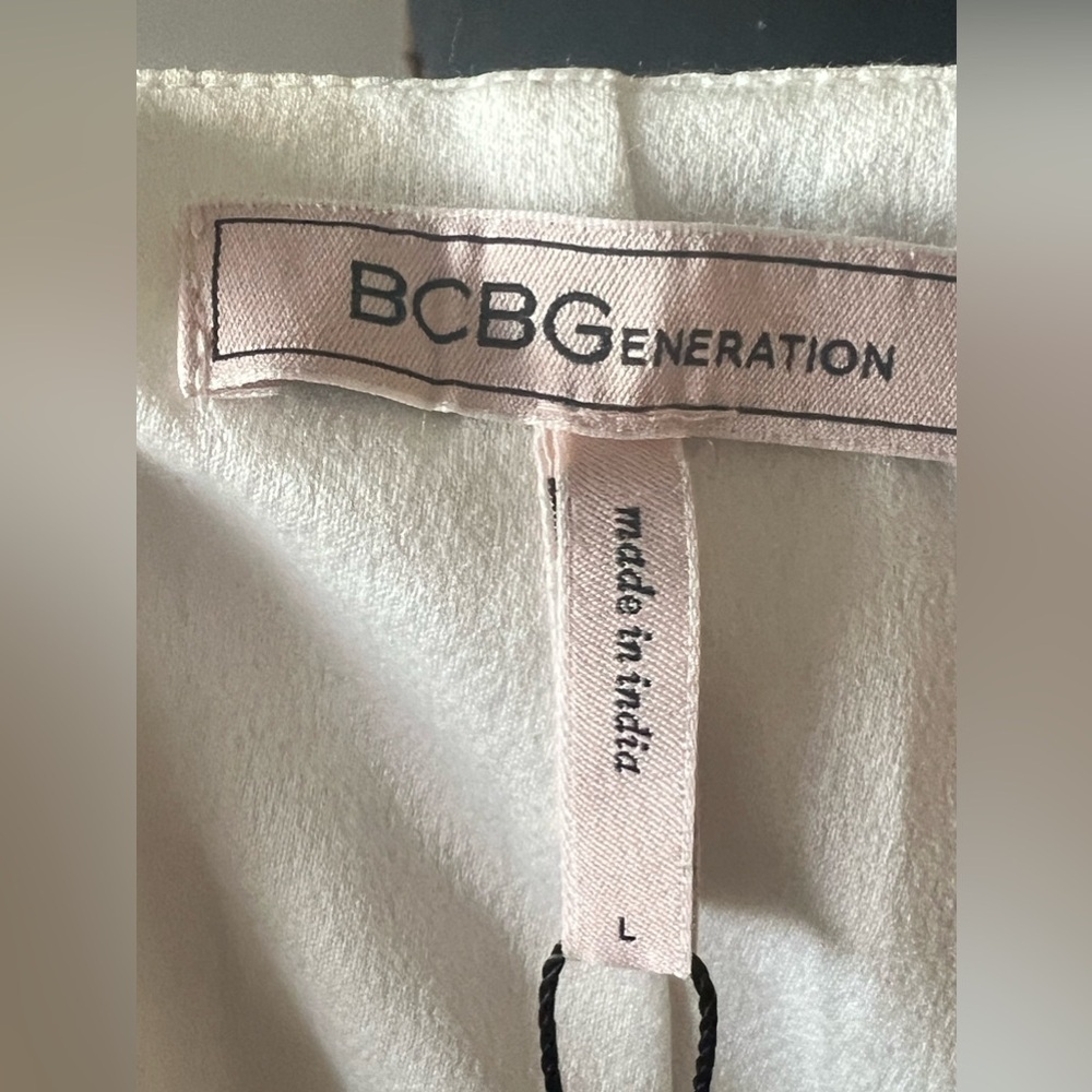 BCBGeneration
Striped Button-Front Romper - Picture 7 of 8